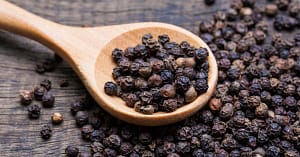 Black Pepper with Wooden Spoon